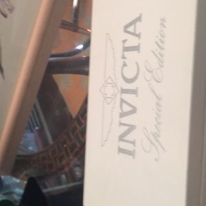 Invicta watch with multiple bands